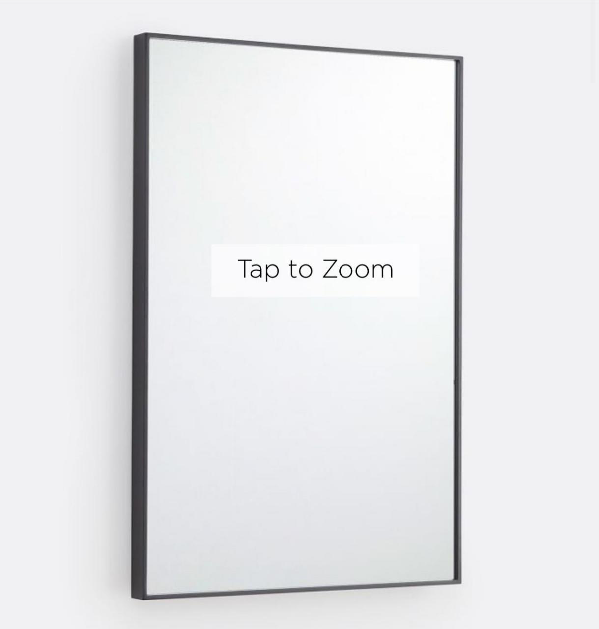 Bathroom mirror with black aluminum frame.